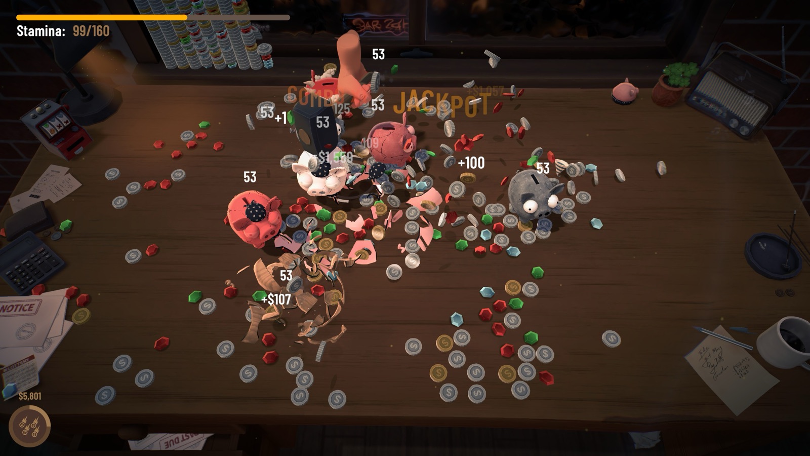 Early run — the desk covered in coins and smashed piggy banks after our first jackpot